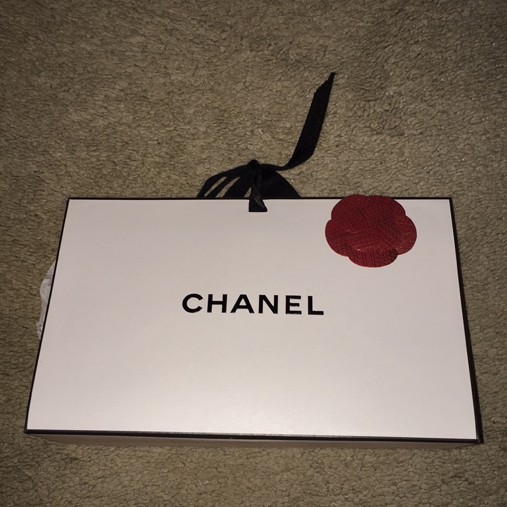 Authentic Chanel gift bag with black ribbon